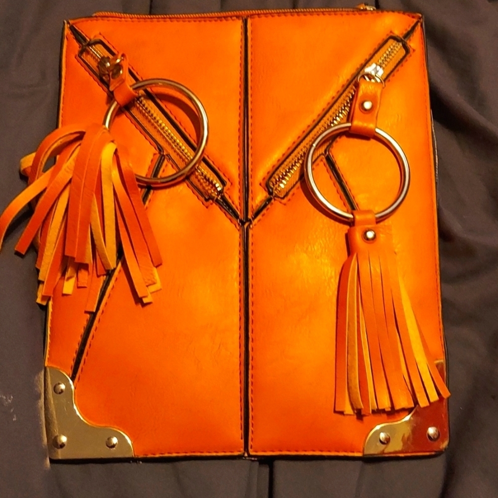 Fabulous leather / chrome clutch by kiss me couture